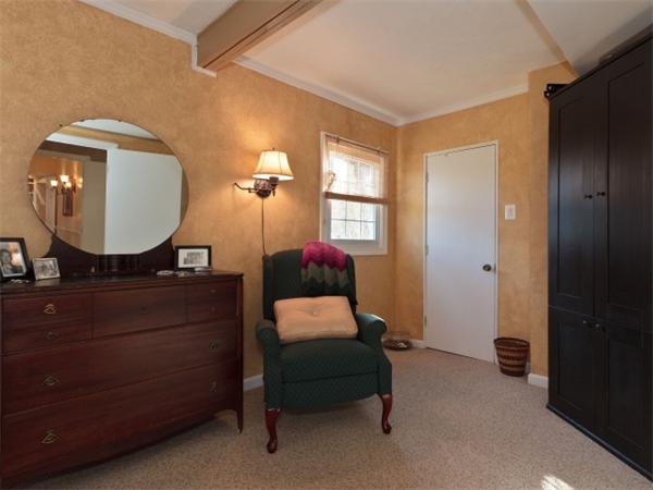 93 Allen Road Billerica, MA 01821 - Photo 15 of 25 a bedroom with a bed and a mirror on dresser