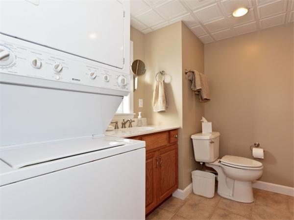 93 Allen Road Billerica, MA 01821 - Photo 16 of 25 a close view of a sink and a washer and dryer