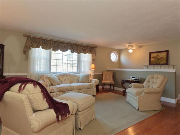 93 Allen Road Billerica, MA 01821 - Photo 6 of 25 a living room with furniture and a large window