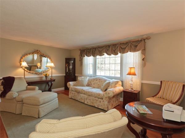93 Allen Road Billerica, MA 01821 - Photo 7 of 25 a living room with furniture and a large window