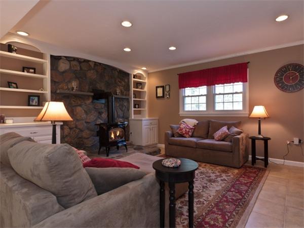 93 Allen Road Billerica, MA 01821 - Photo 10 of 25 a living room with furniture and a fireplace