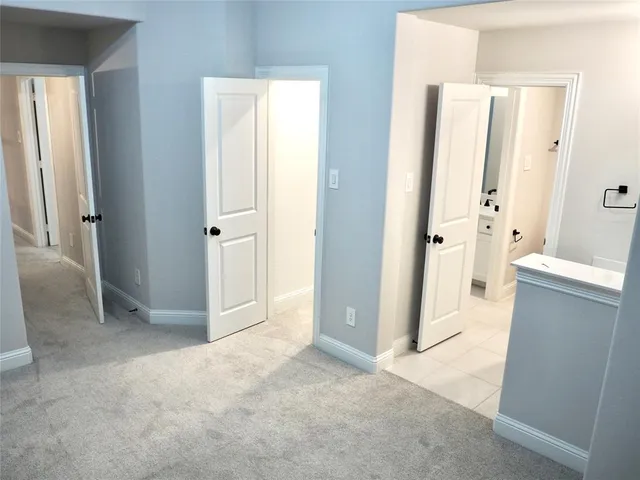 a bathroom with a sink vanity and mirror