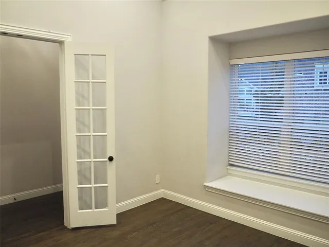 an empty room with window