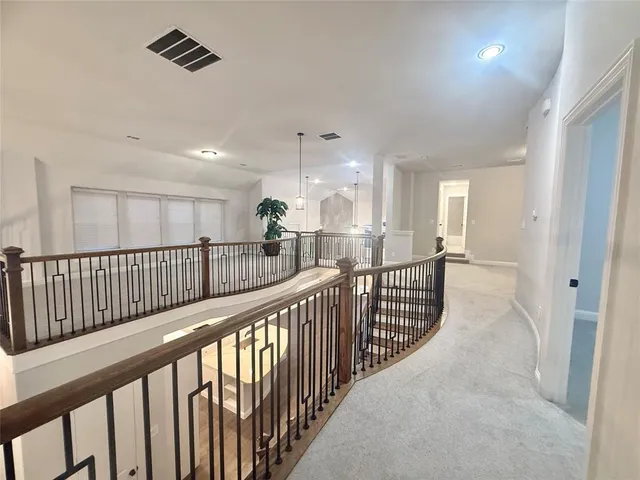 a view of a hallway with closet