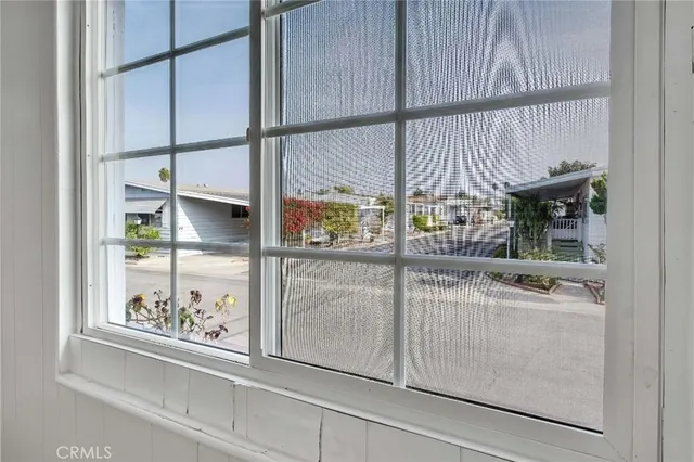 a kitchen with stainless steel appliances granite countertop a refrigerator sink and cabinets