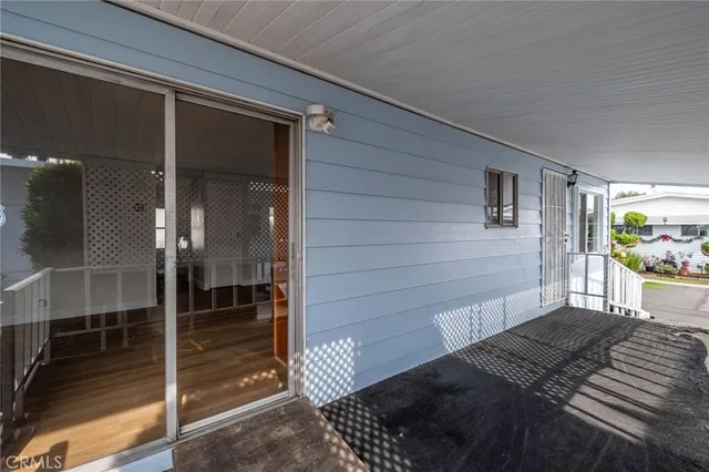 a view of a house with wooden floor and stairs