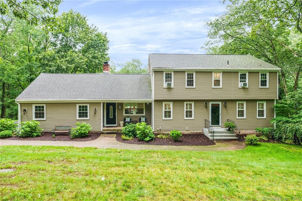 435 Woodhaven Road Glastonbury, CT 06033 - Photo 1 of 1 a front view of a house with garden