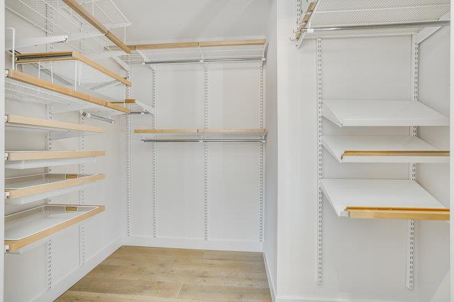 908 Holly Road Belmont, CA 94002 - Photo 21 of 50 a view of walk in closet with empty racks
