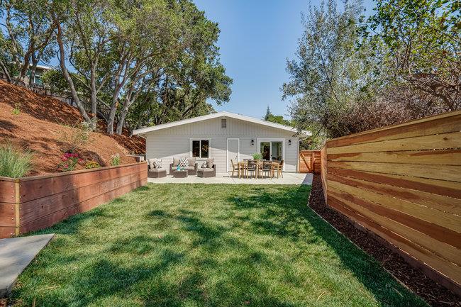 908 Holly Road Belmont, CA 94002 - Photo 33 of 50 a front view of a house with garden