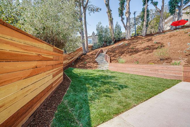 908 Holly Road Belmont, CA 94002 - Photo 34 of 50 a view of a yard with an outdoor space