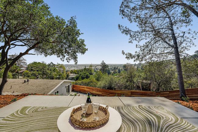 908 Holly Road Belmont, CA 94002 - Photo 38 of 50 a view of swimming pool with a yard