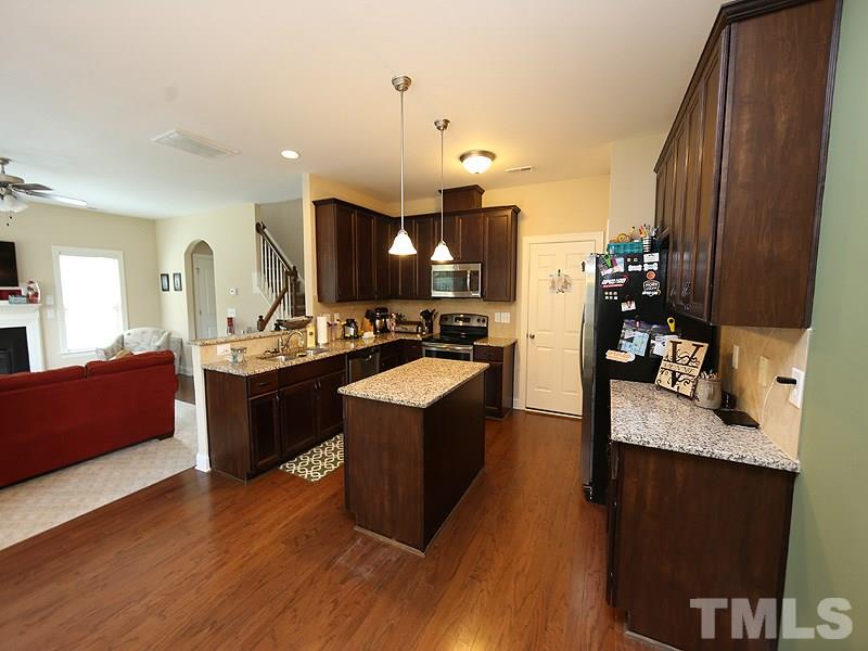 69 Arbor Loop Angier, NC 27501 - Photo 3 of 13 Great kitchen with SS Appliances that all stay and granite countertops