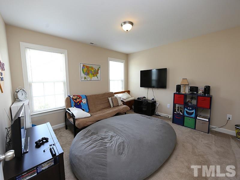 69 Arbor Loop Angier, NC 27501 - Photo 10 of 13 Big bedroom/playroom/office so many ways to use this room