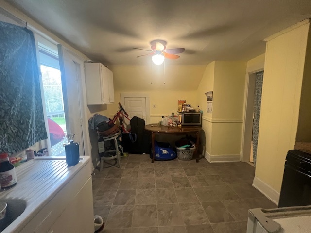 312 North 5th Avenue Kankakee, IL 60901 - Photo 13 of 22 a living room with furniture and a flat screen tv
