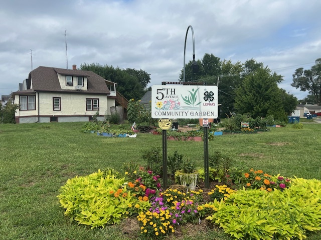 312 North 5th Avenue Kankakee, IL 60901 - Photo 4 of 22 a sign on the side of the grass