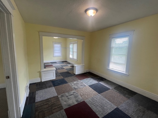312 North 5th Avenue Kankakee, IL 60901 - Photo 6 of 22 a bedroom with a bed and a window