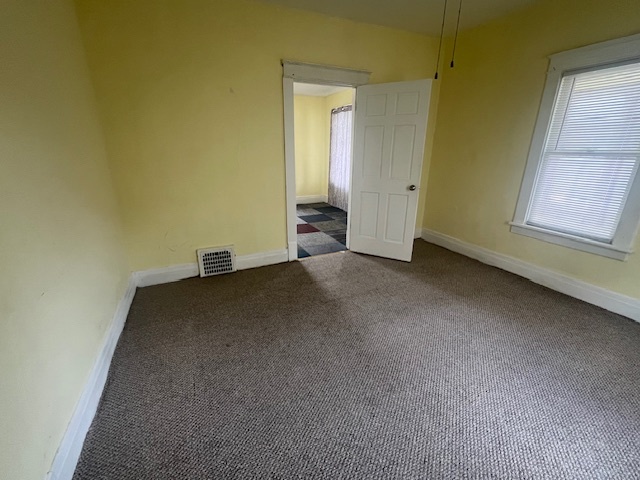 312 North 5th Avenue Kankakee, IL 60901 - Photo 10 of 22 an empty room with windows