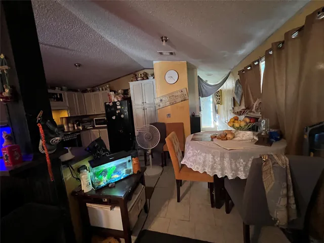 a room with furniture and gym equipment