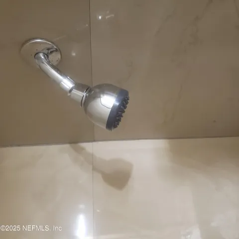 a refrigerator freezer sitting inside of a kitchen