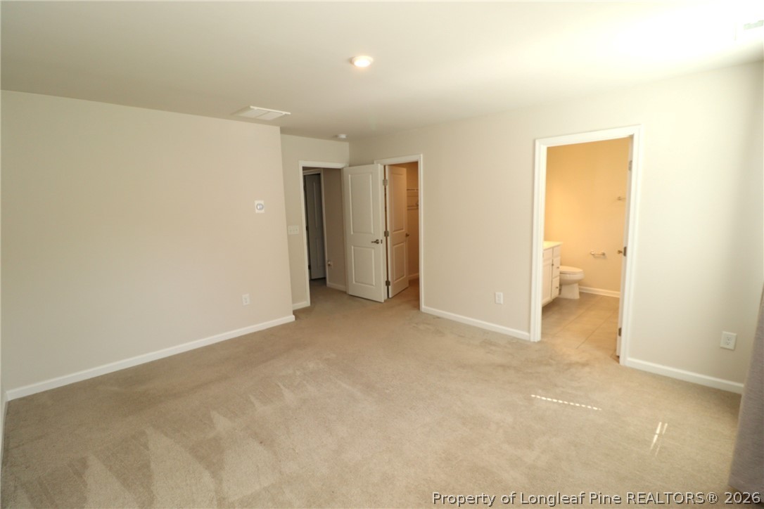 244 Amber Acorn Avenue Raleigh, NC 27603 - Photo 23 of 50 a view of an empty room