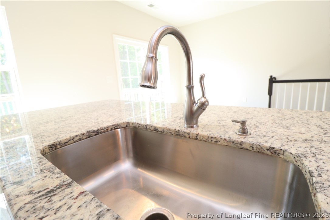 244 Amber Acorn Avenue Raleigh, NC 27603 - Photo 9 of 50 a view of a bathtub in a bathroom