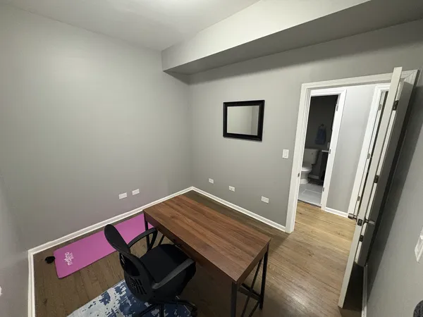 a view of a living room and a hallway