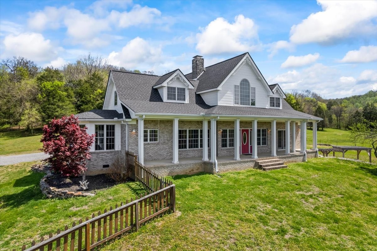 216 Old Wolf Hill Road Bethpage, TN 37022 - Photo 62 of 70 a front view of house with yard and green space