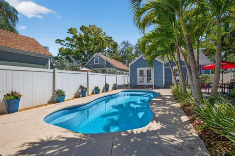 a view of a house with swimming pool