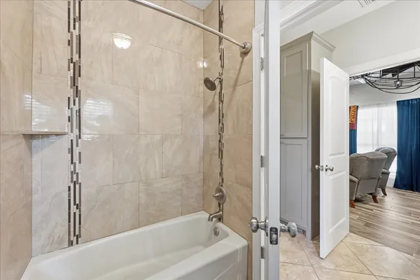 a view of a storage and utility room with a sink