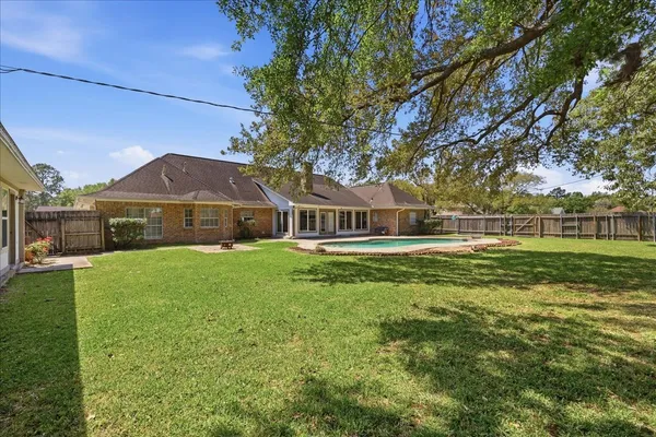 a view of house with outdoor space and street view