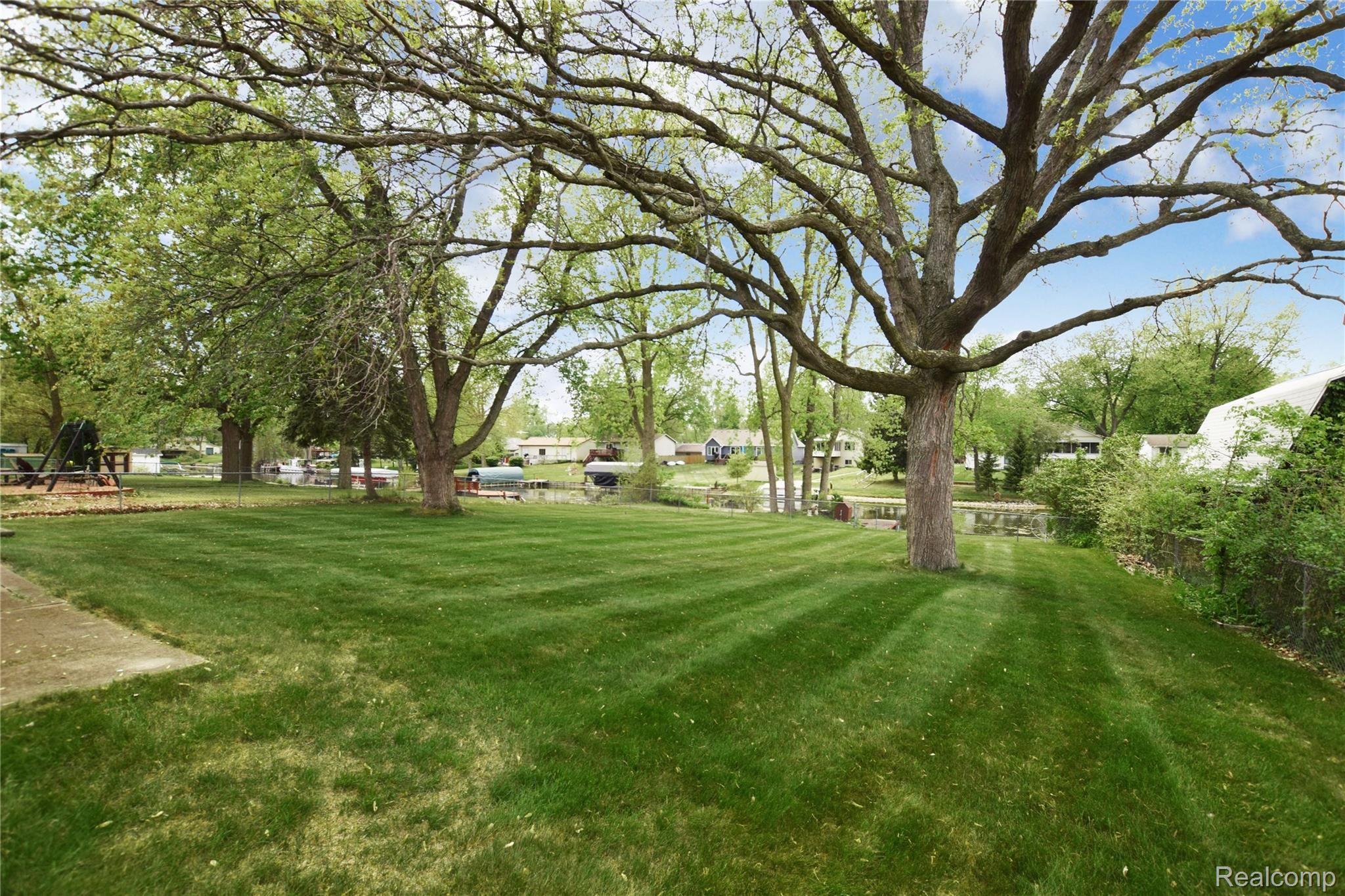 14184 North Road Fenton, MI 48430 - Photo 15 of 16 Fenced Backyard