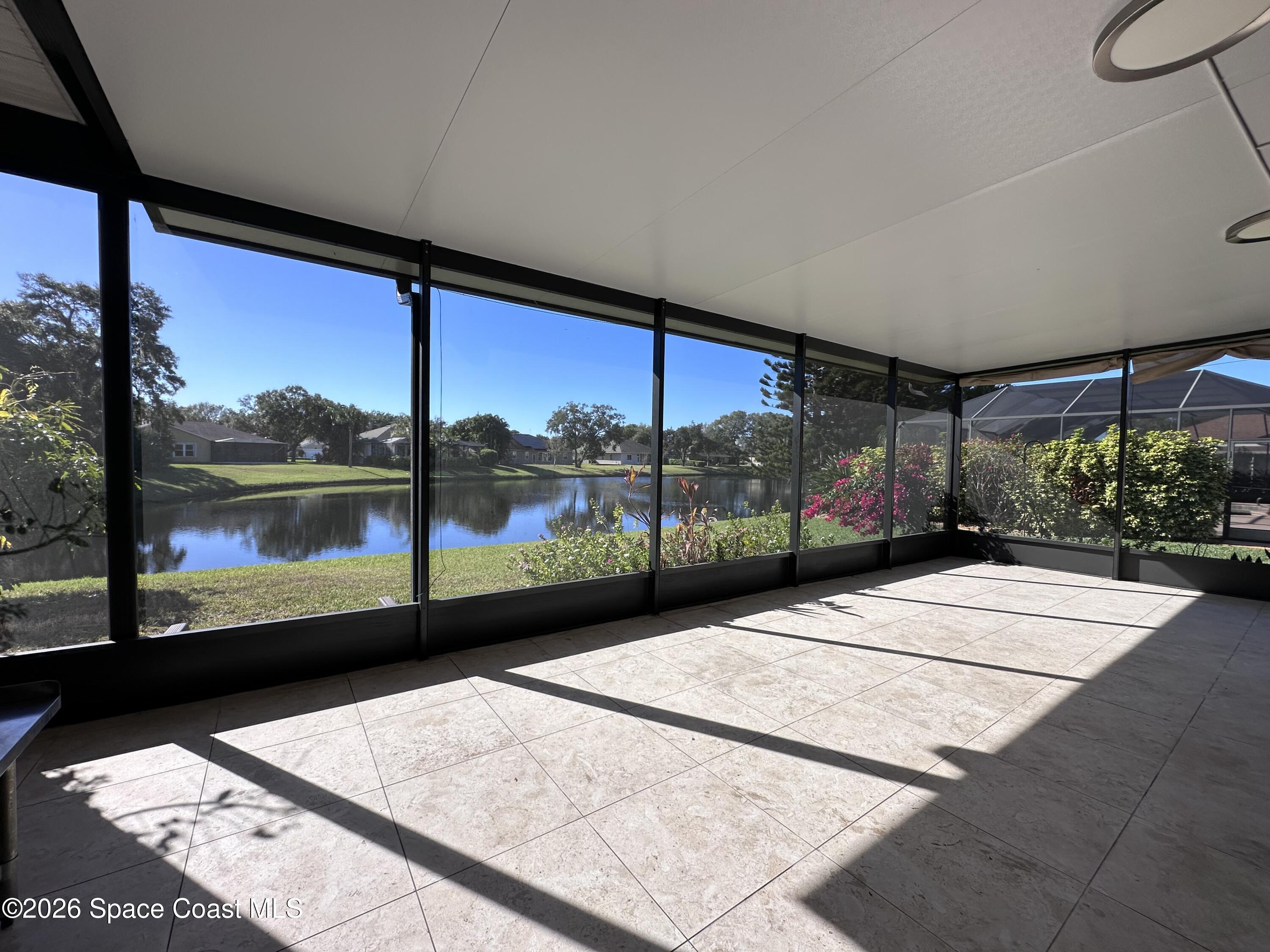 883 Spring Oak Drive Melbourne, FL 32901 - Photo 35 of 45 a view of a street with a large window