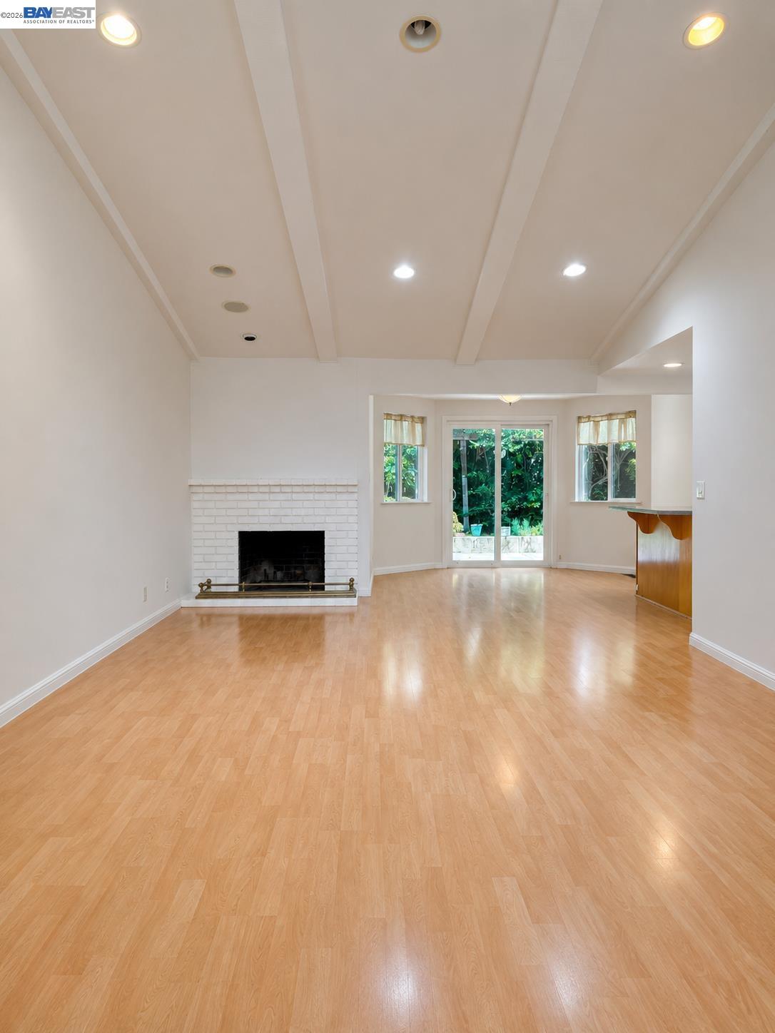 2516 Dos Rios Drive San Ramon, CA 94583 - Photo 3 of 14 a view of an empty room with a fireplace and a window