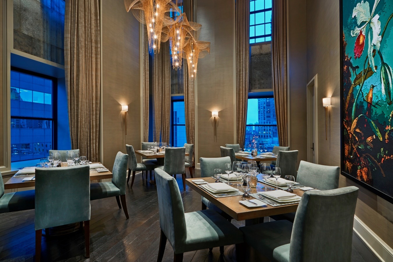 118 East Erie Street, Unit 18A Chicago, IL 60611 - Photo 34 of 40 a view of a dining room with furniture and chandelier