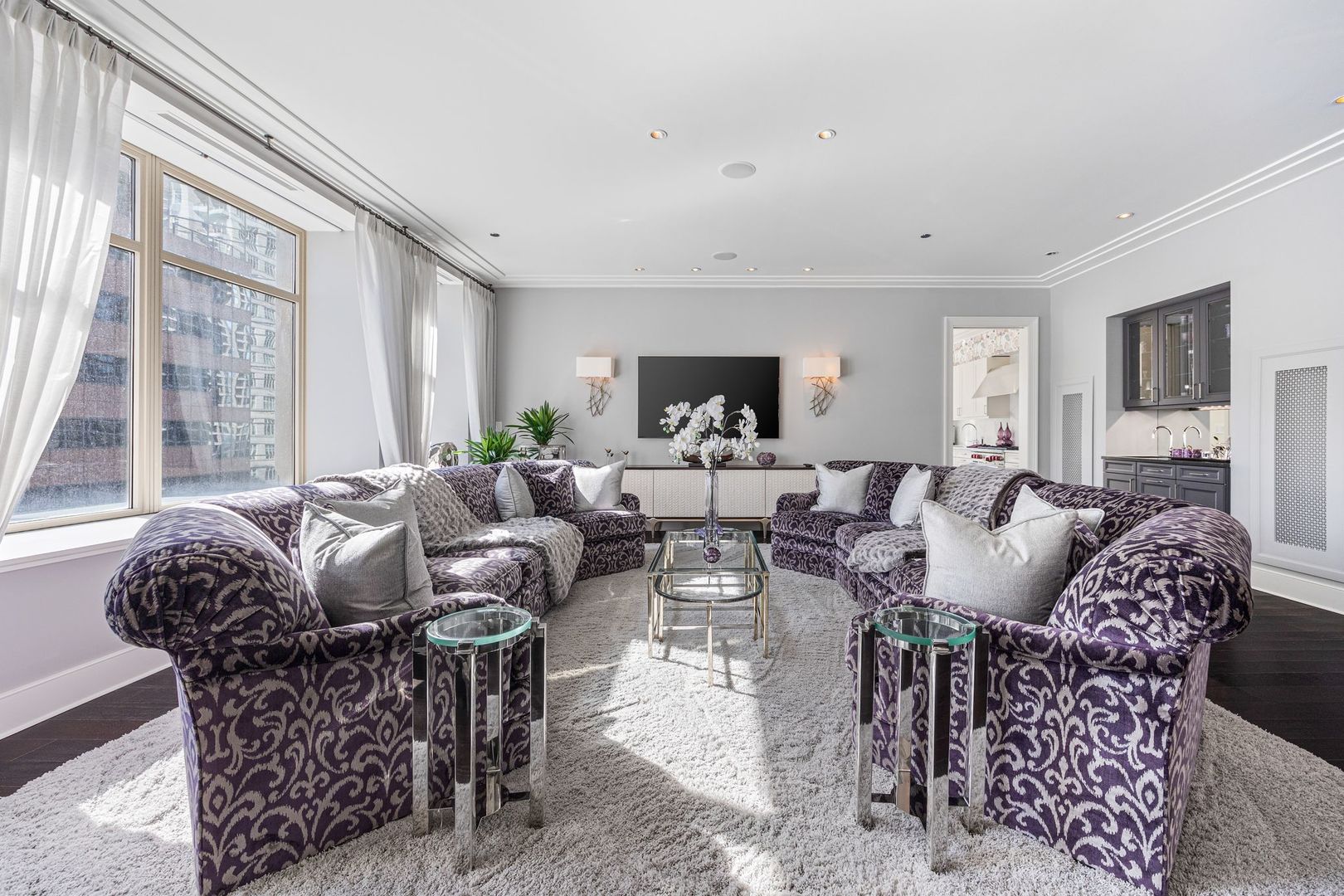 118 East Erie Street, Unit 18A Chicago, IL 60611 - Photo 4 of 40 a living room with furniture and a large window