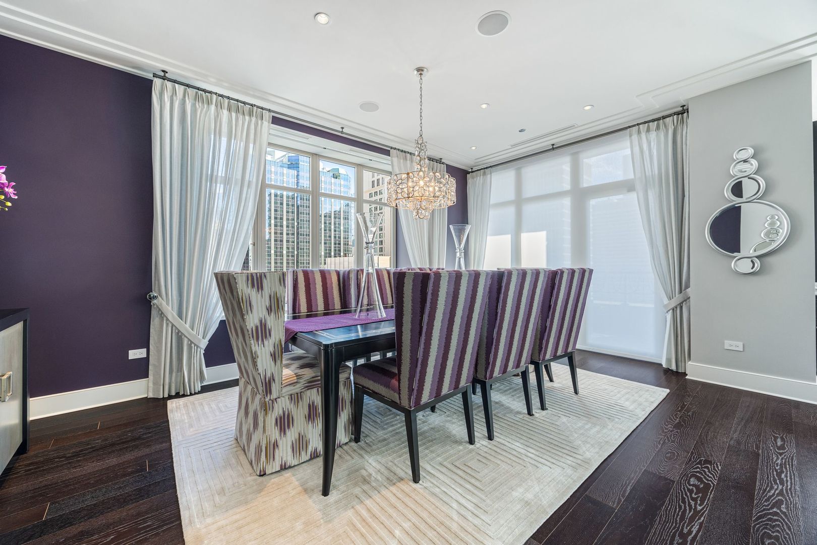 118 East Erie Street, Unit 18A Chicago, IL 60611 - Photo 8 of 40 a view of a dining room with furniture window and wooden floor