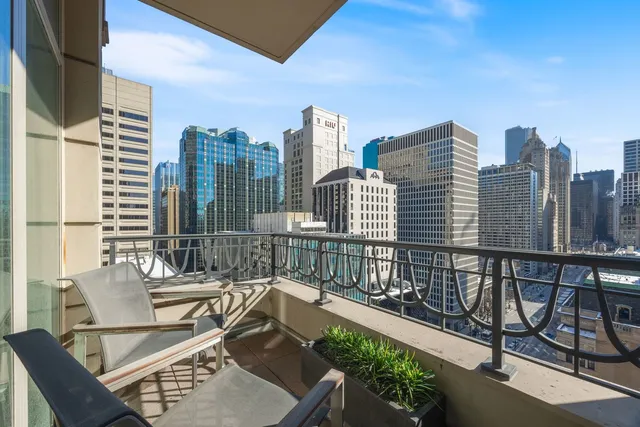 a view of a balcony with city view