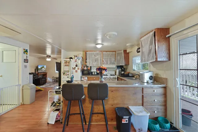 a bathroom with a double vanity sink and mirror
