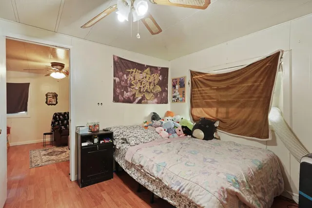 a storage room with wooden floor