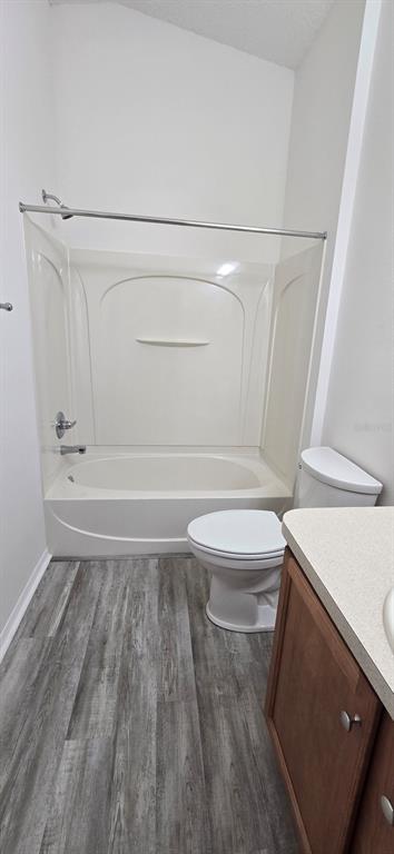 1009 Ridgeville Road The Villages, FL 32162 - Photo 11 of 16 a bathroom with a sink a toilet and shower