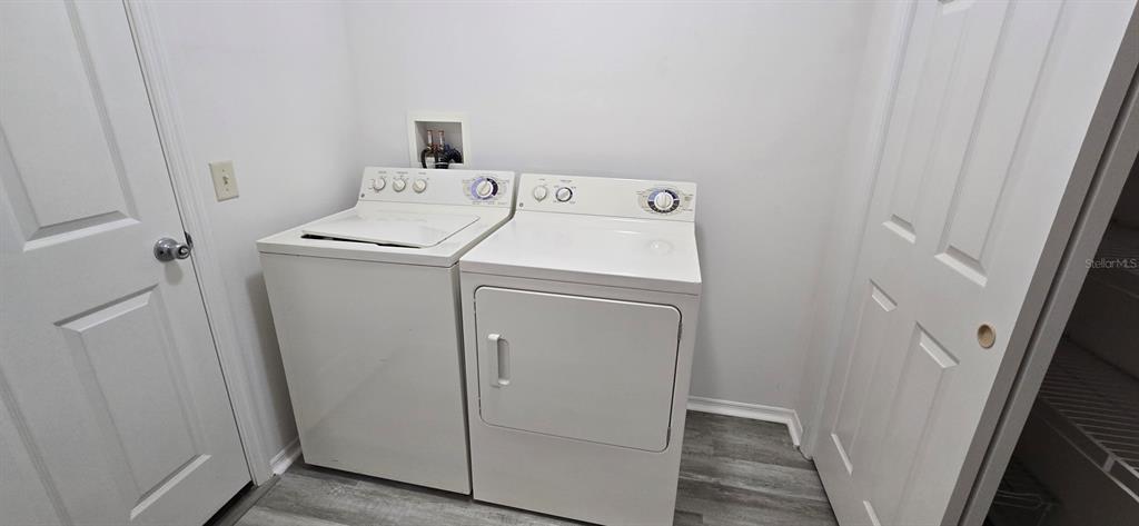 1009 Ridgeville Road The Villages, FL 32162 - Photo 15 of 16 a utility room with dryer and washer