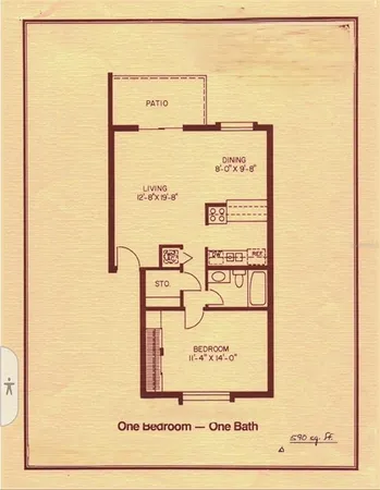 a sign on the wall next to a road