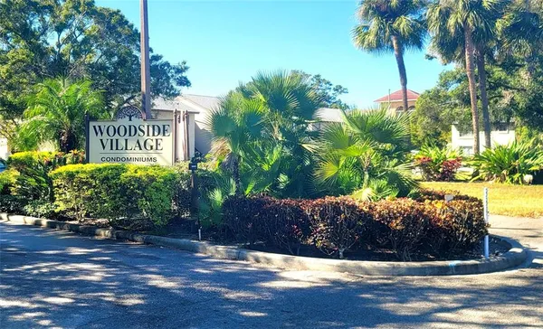 a view of a house with a street