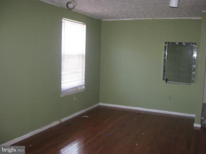 100 Sandhill Road Essex, MD 21221 - Photo 6 of 10 a small space with a window
