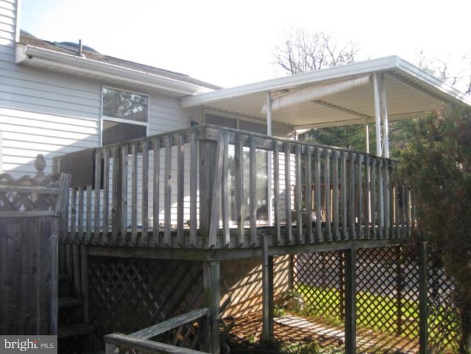 100 Sandhill Road Essex, MD 21221 - Photo 9 of 10 a view of balcony with wooden floor