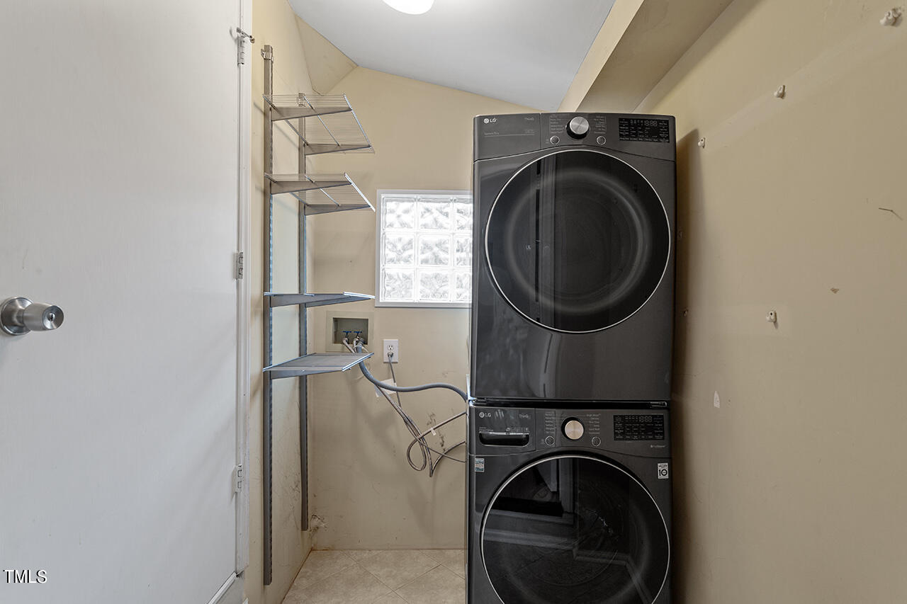 1607 Lorraine Road Raleigh, NC 27607 - Photo 31 of 37 a utility room with dryer and washer