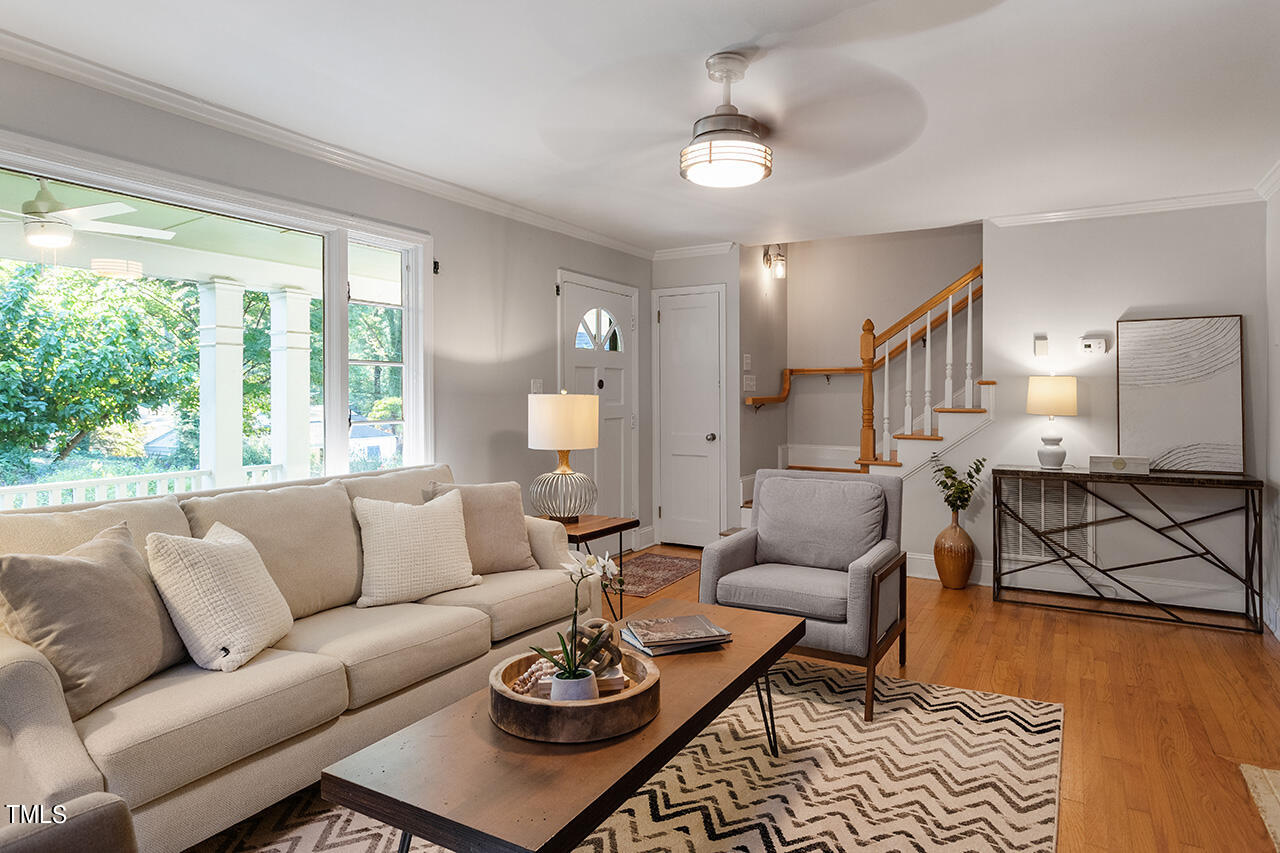 1607 Lorraine Road Raleigh, NC 27607 - Photo 7 of 37 a living room with furniture and a table