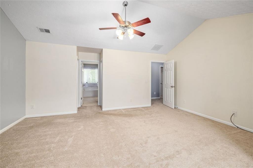 3286 High View Court Gainesville, GA 30506 - Photo 22 of 38 an empty room with closet and ceiling fan