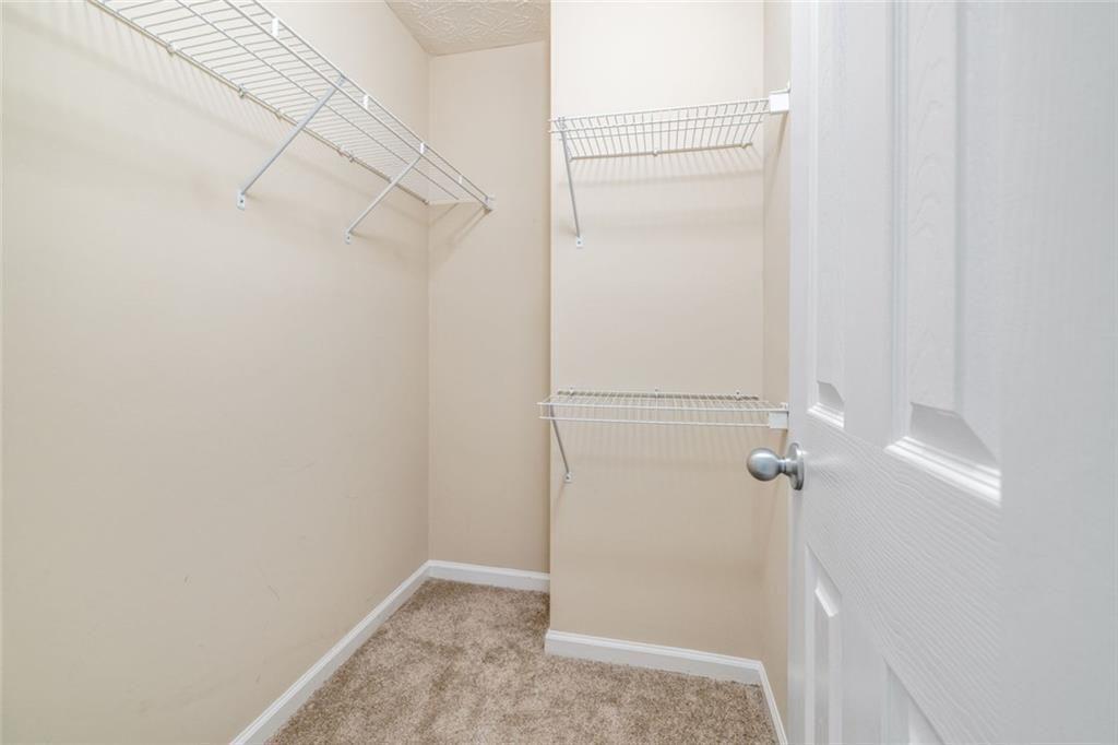 3286 High View Court Gainesville, GA 30506 - Photo 24 of 38 a view of a room with racks on the wall