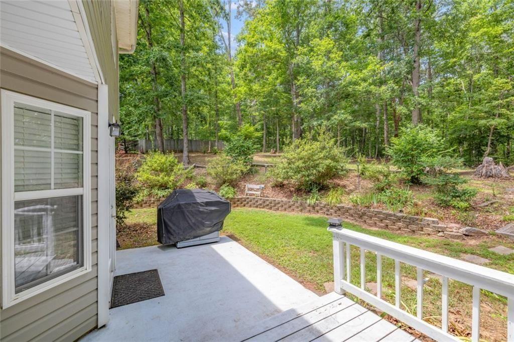 3286 High View Court Gainesville, GA 30506 - Photo 9 of 38 a view of a porch with furniture and garden